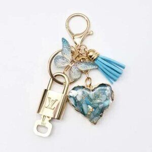 100% Auth Louis Vuitton Lock & Key with unbranded Bagcharm, Keycharm, Keychain